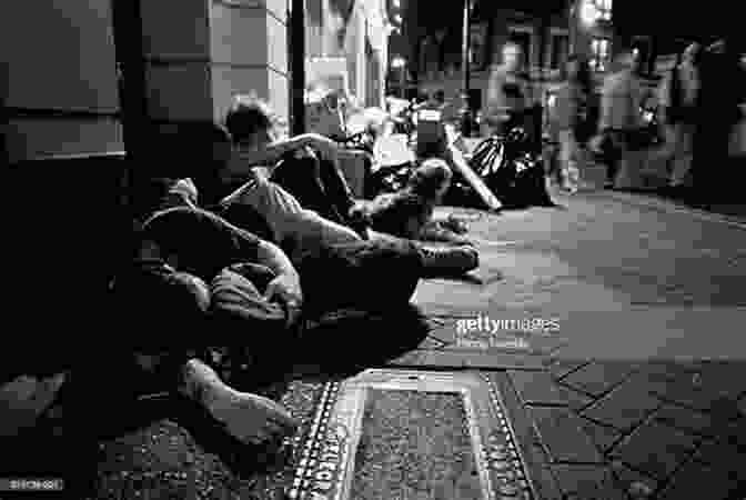 A Photo Of A Group Of Homeless People Huddled Together On A Cold Night, With A Cityscape In The Background. Coffee About Tenerife A Canary Island Best Sunny Winter Destination Photographed : A Heavy Photo Reportage: Playa De Las Americas Los Cristianos Islands Best Sunny Winter Destination 1)