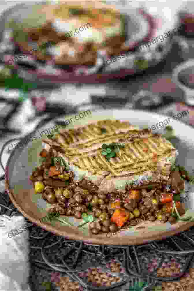 A Tantalizing Photo Of A Vegan Shepherd's Pie, Featuring A Rich, Flavorful Lentil Filling Topped With A Golden Brown Parsnip And Sweet Potato Mash, Evoking The Nostalgia Of Classic Comfort Food. Vegan Comfort Food: Favorite Wholesome Plant Based Recipes